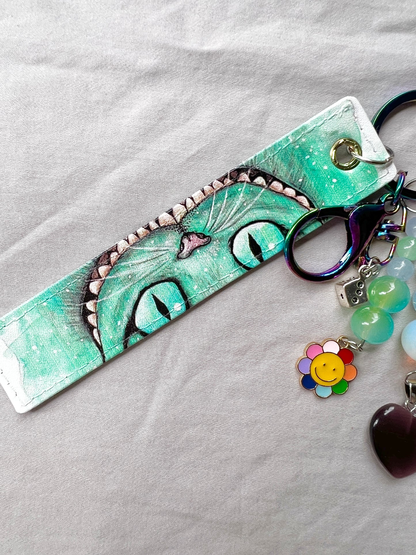 We’re All Mad Here Lucky Charm Keychain