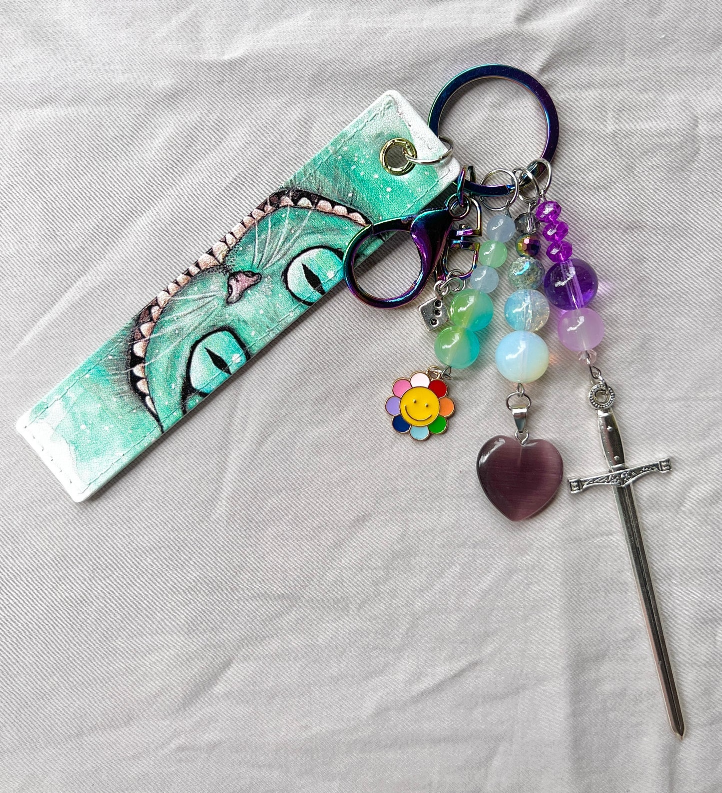 We’re All Mad Here Lucky Charm Keychain
